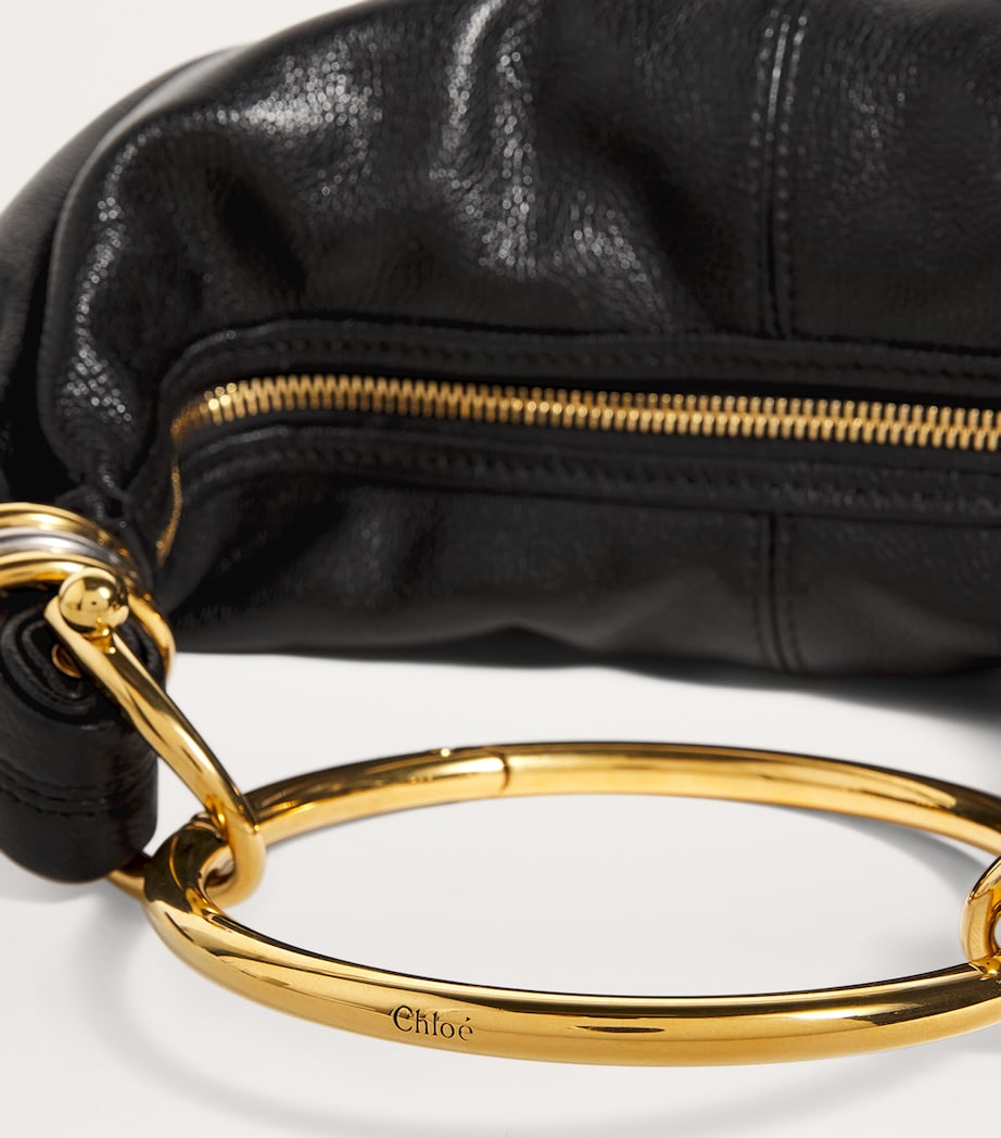 Chloé small leather top-handle bracelet bag, UK version