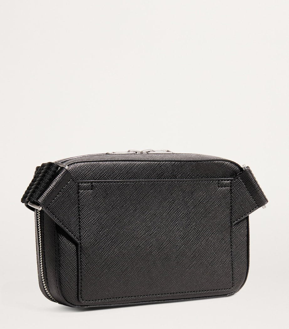 Sandro Paris small recycled leather cross-body bag, imported from the UK