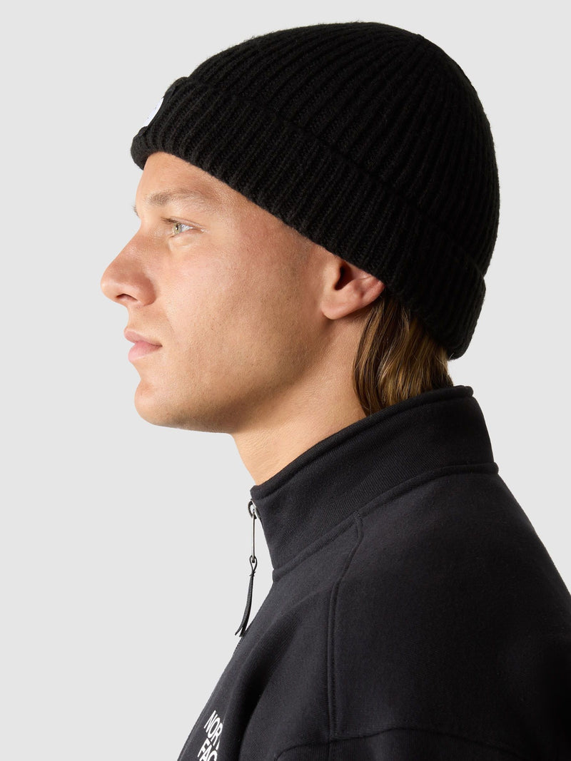 The North Face black logo box cuffed beanie, imported from the UK