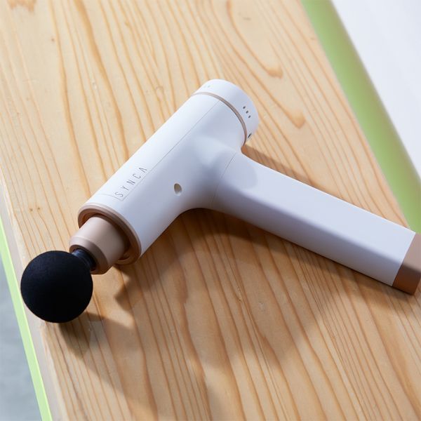 Synca Kitta percussive massage gun with 6 interchangeable heads - British product