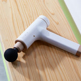 Synca Kitta percussive massage gun with 6 interchangeable heads - British product