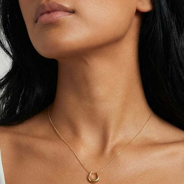 MUCHV horseshoe snake chain necklace in 18k gold or silver (British brand)