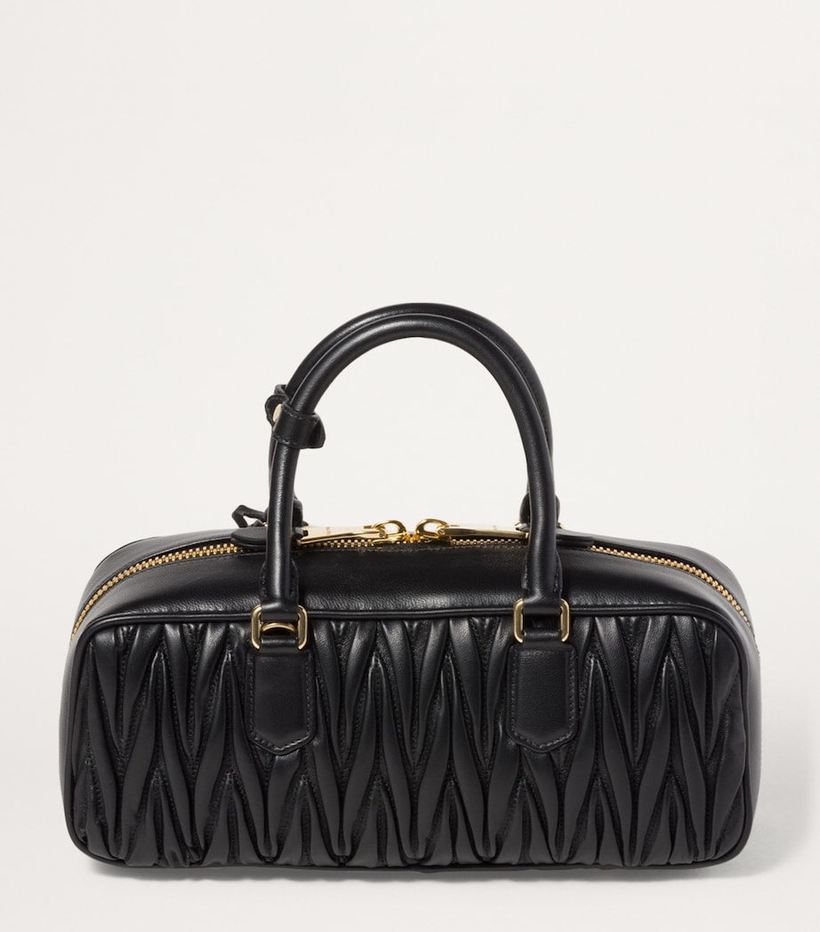 Miu Miu Arcadie top-handle bag imported from the UK