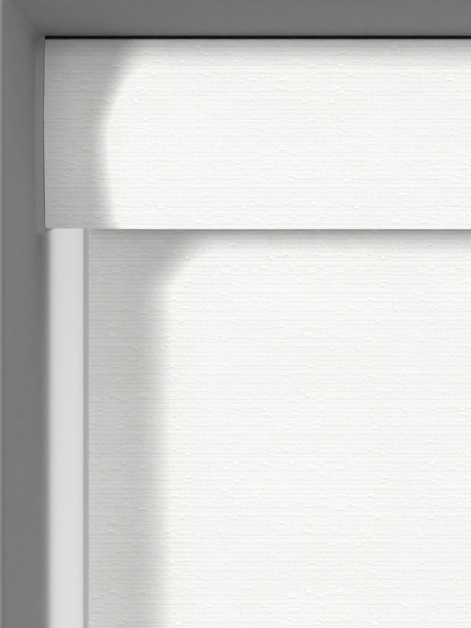 Next White Raven made to measure roller blind, imported from the UK