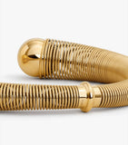 Alaïa spiral gold-tone choker with metal beads, imported from the UK