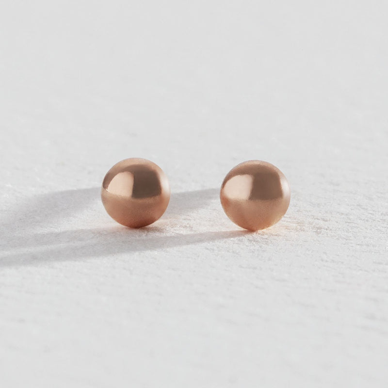 Revere rose gold ball stud earrings (British brand)