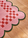 Eleanor Bowmer pink scallop checkerboard wool tufted rug, UK version