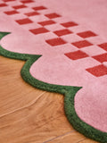 Eleanor Bowmer pink scallop checkerboard wool tufted rug, UK version