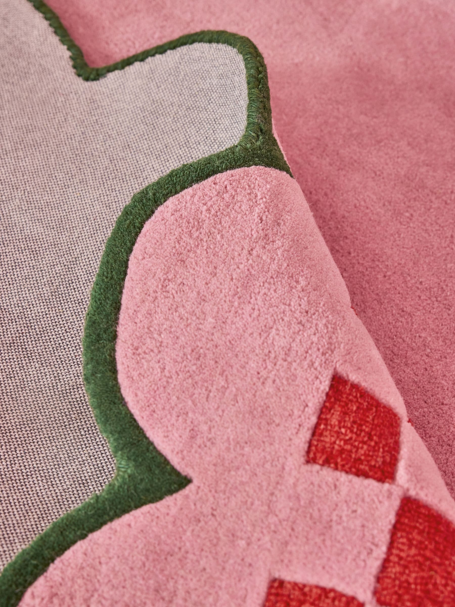 Eleanor Bowmer pink scallop checkerboard wool tufted rug, UK version