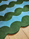 Eleanor Bowmer wool tufted rug green blue wavey, imported from the UK