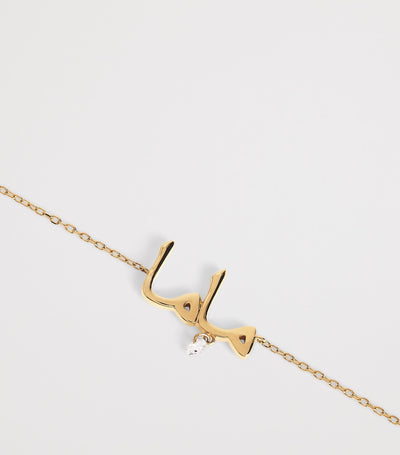 Bracelet en or jaune 18 carats avec diamants et inscription 