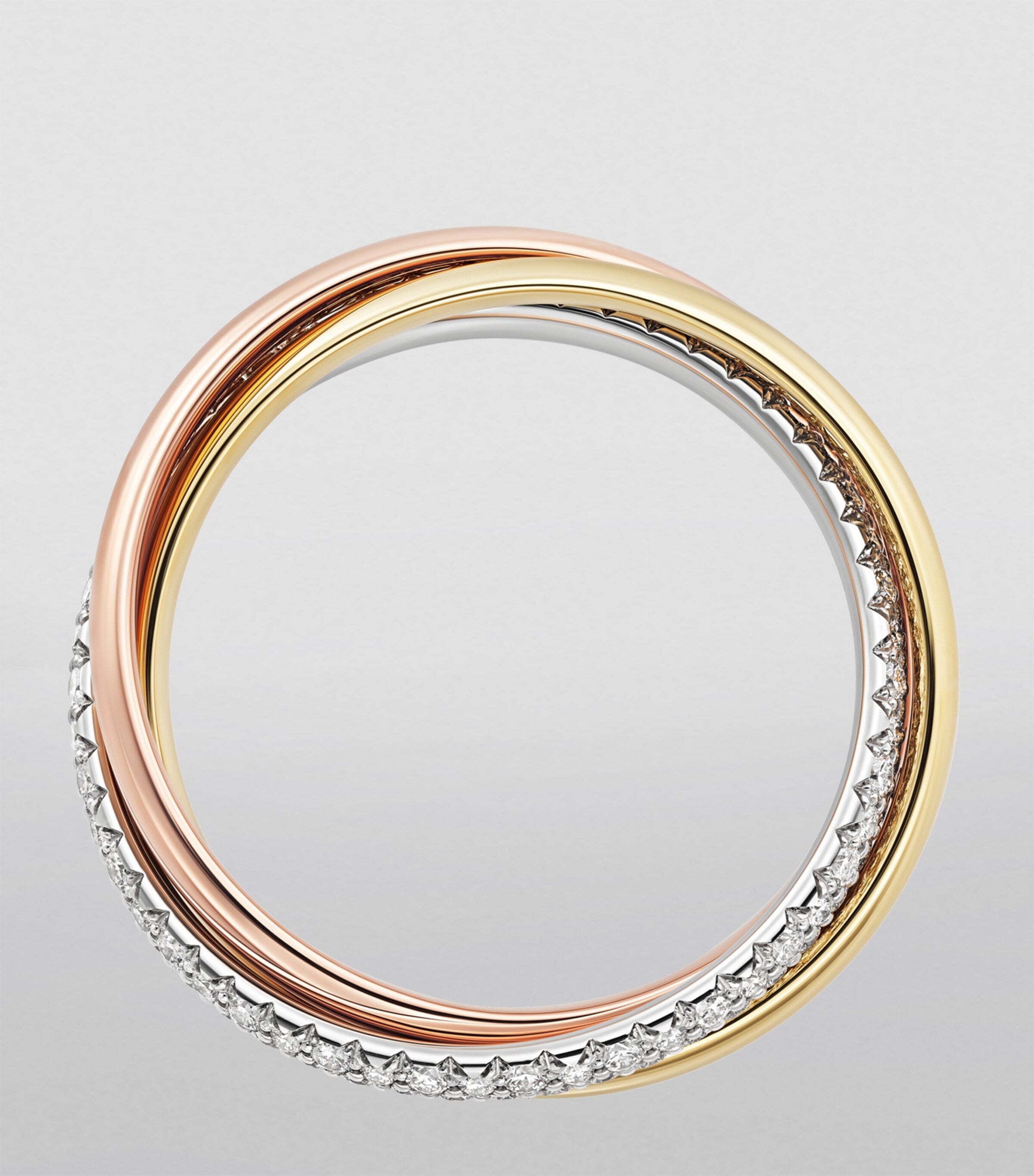 Cartier small Trinity ring three gold bands with pavé diamonds, imported from the UK