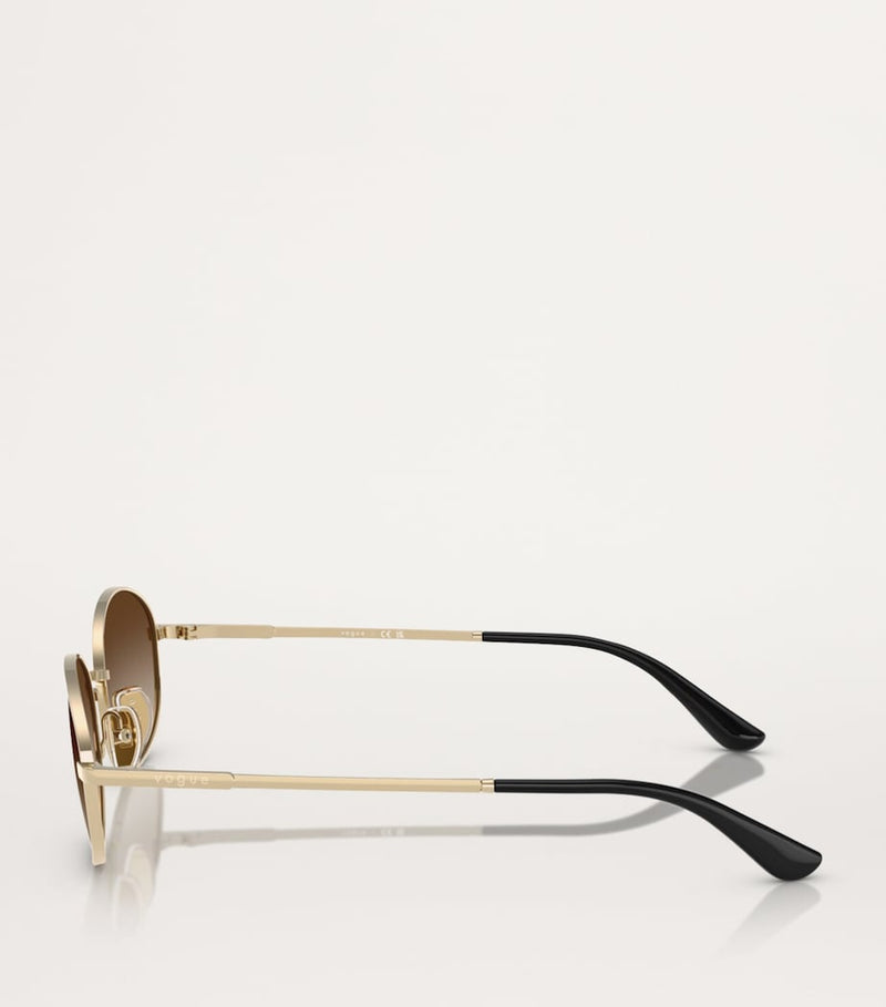 Vogue metal sunglasses with graduated tint lenses, imported from the UK