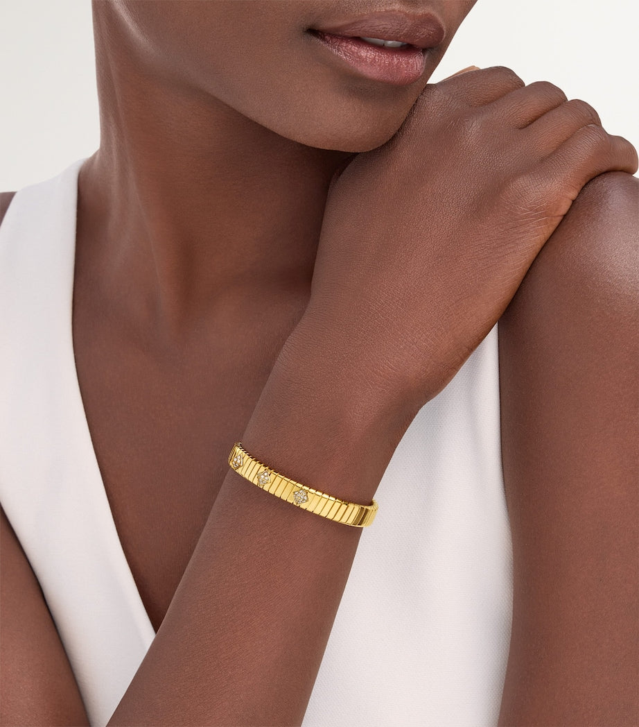 Bvlgari yellow gold Tubogas bangle with diamonds (British brand)