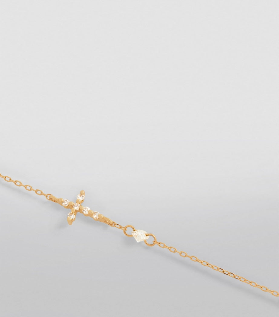 Persée gold cross bracelet with diamonds (British brand)