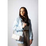 SVNX woven PU shoulder bag in cream, imported from the UK