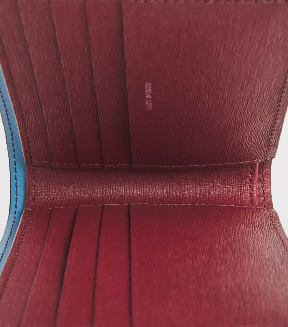 Paul Smith skinn lommebok med fals med Signature Stripe-fôr, importert fra Storbritannia