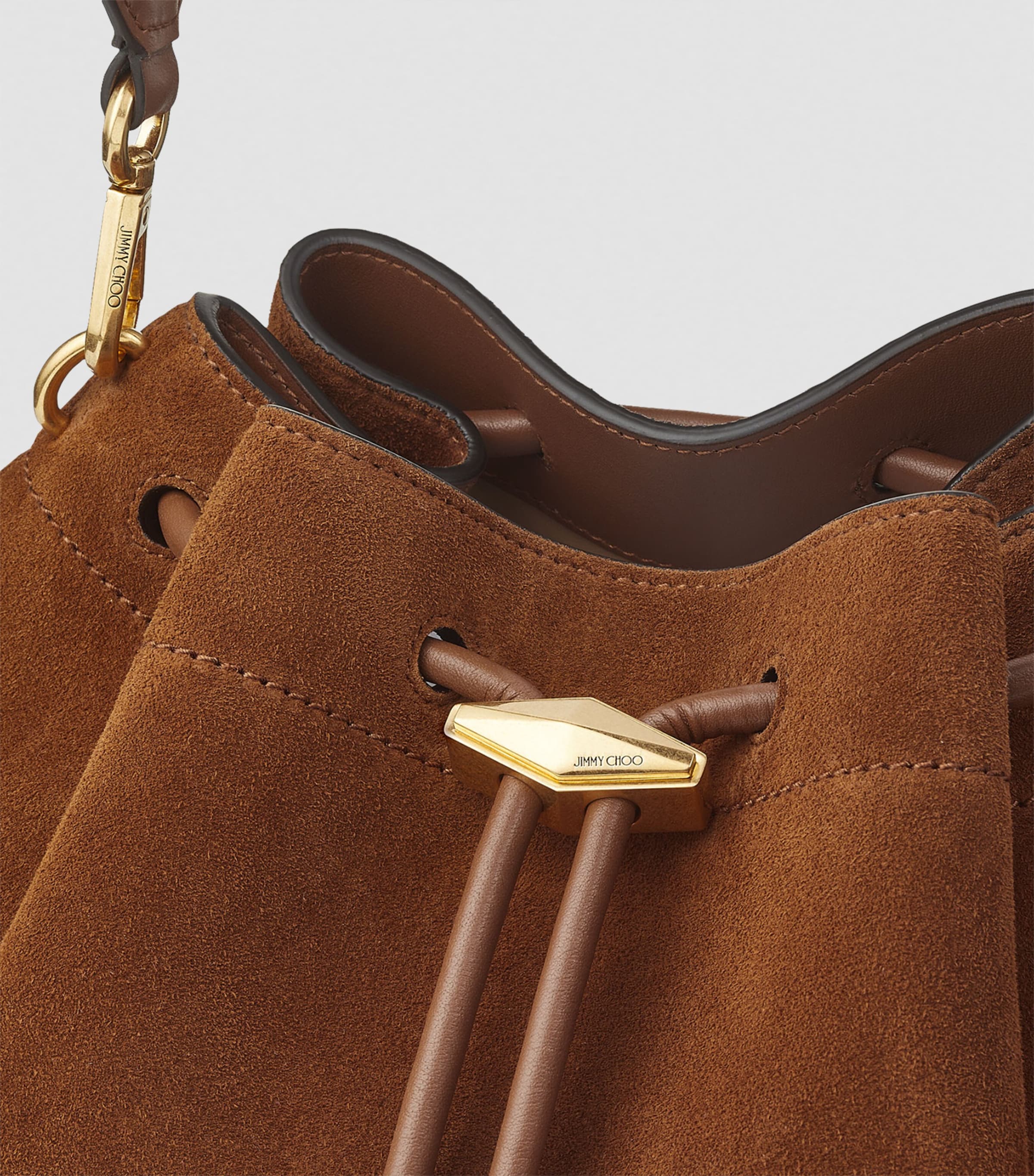 Jimmy Choo medium cinch suede shoulder bag, imported from the UK