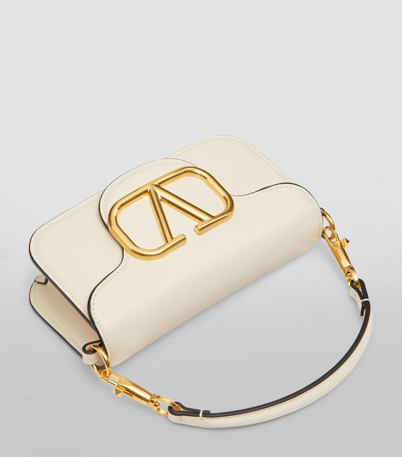 Valentino Garavani Locò small leather shoulder bag, imported from the UK