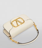 Valentino Garavani Locò small leather shoulder bag, imported from the UK