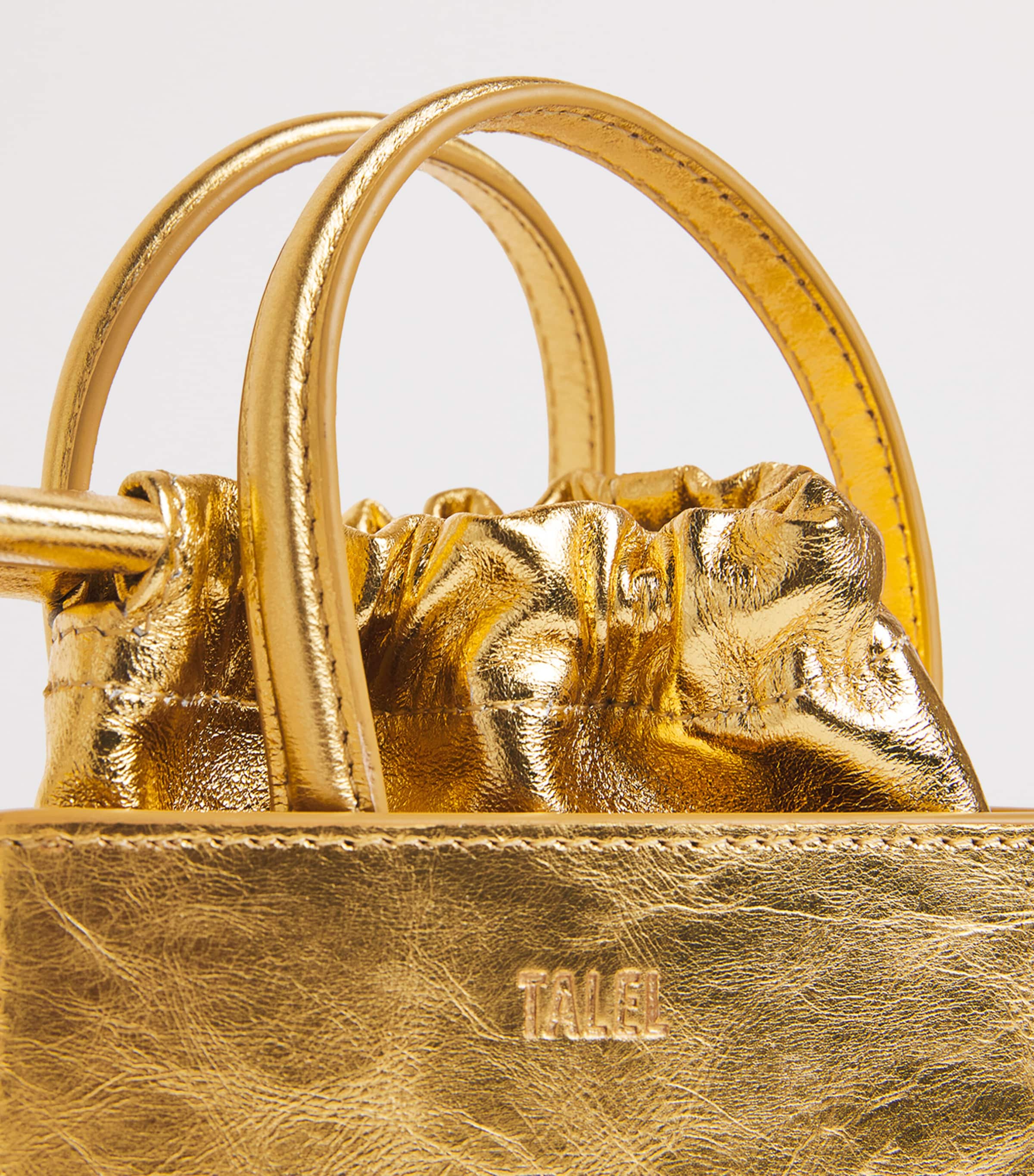 Talel Paris metallic leather triangle top-handle bag (British brand)