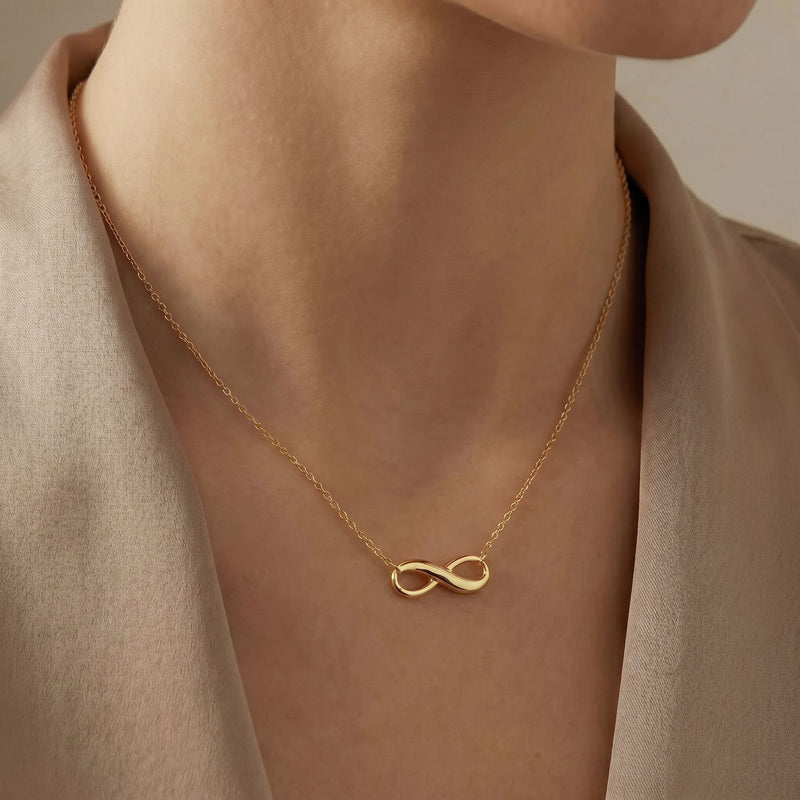 Revere 9ct yellow gold infinity pendant necklace, imported from the UK