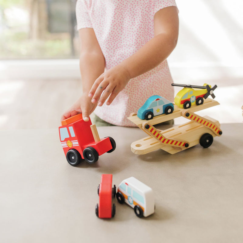 Melissa & Doug Wooden Emergency Vehicle Transporter Truck, imported from the UK