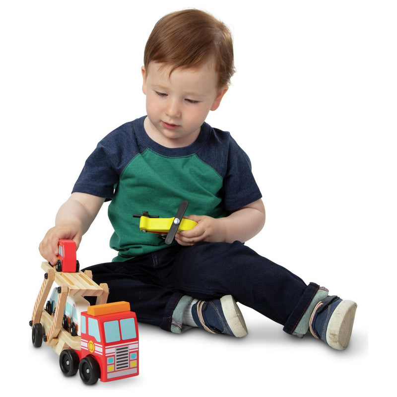 Melissa & Doug Wooden Emergency Vehicle Transporter Truck, imported from the UK