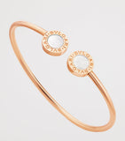 Bvlgari rose gold bangle with mother-of-pearl, imported from the UK