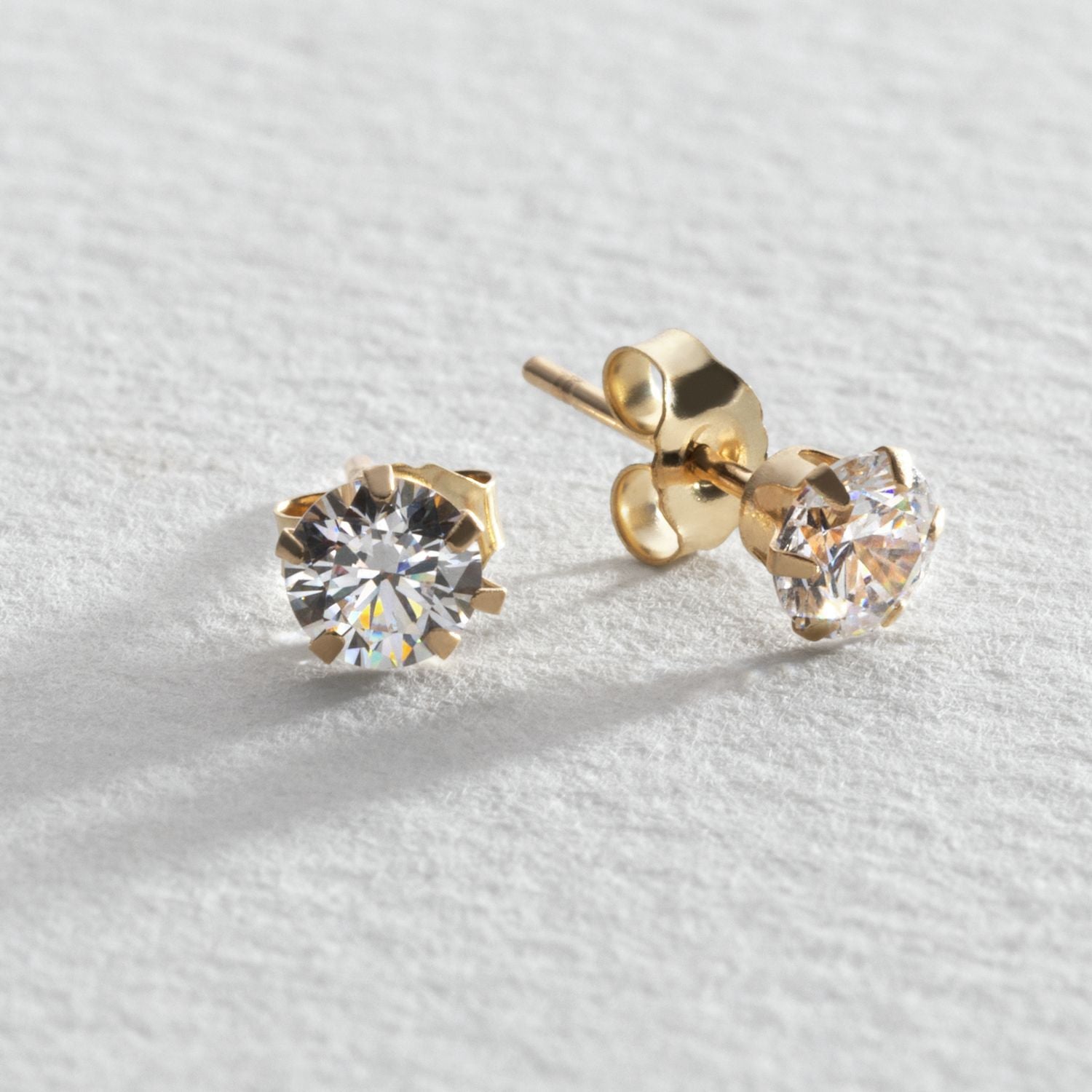 Revere 9ct gold cubic zirconia stud earrings 4mm, UK version