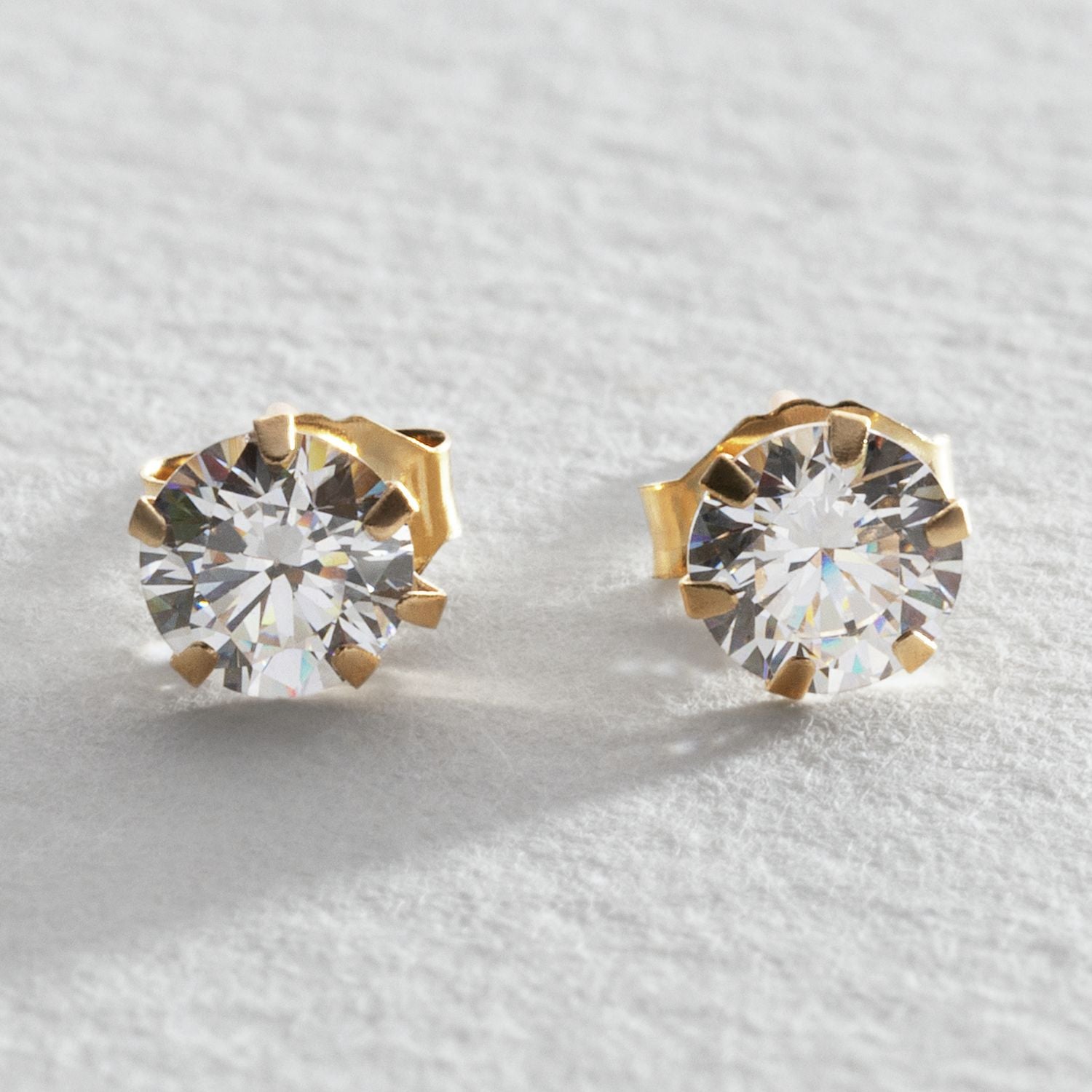 Revere 9ct gold cubic zirconia stud earrings 4mm, UK version