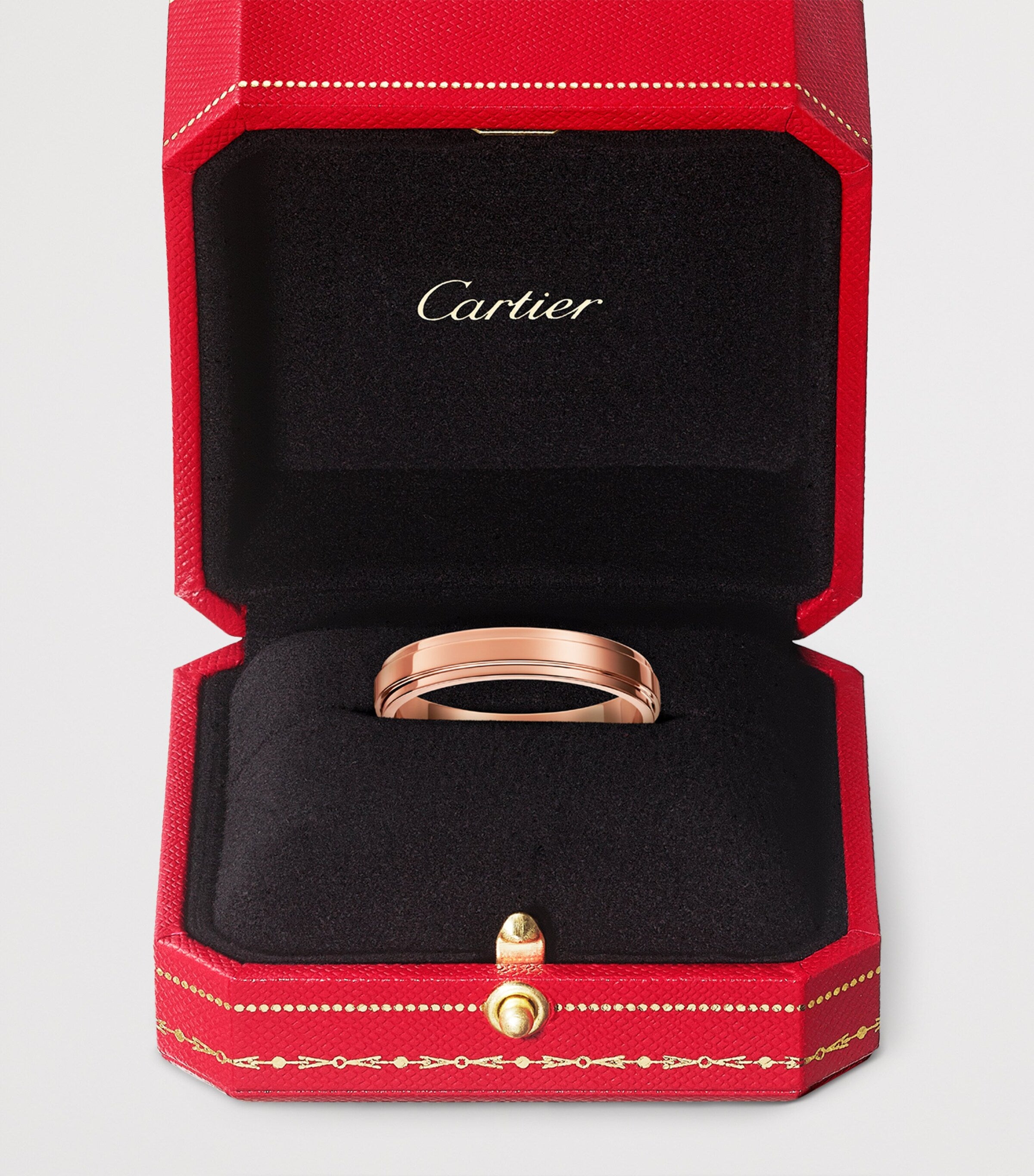 Cartier d'Amour rose gold wedding ring, imported from the UK