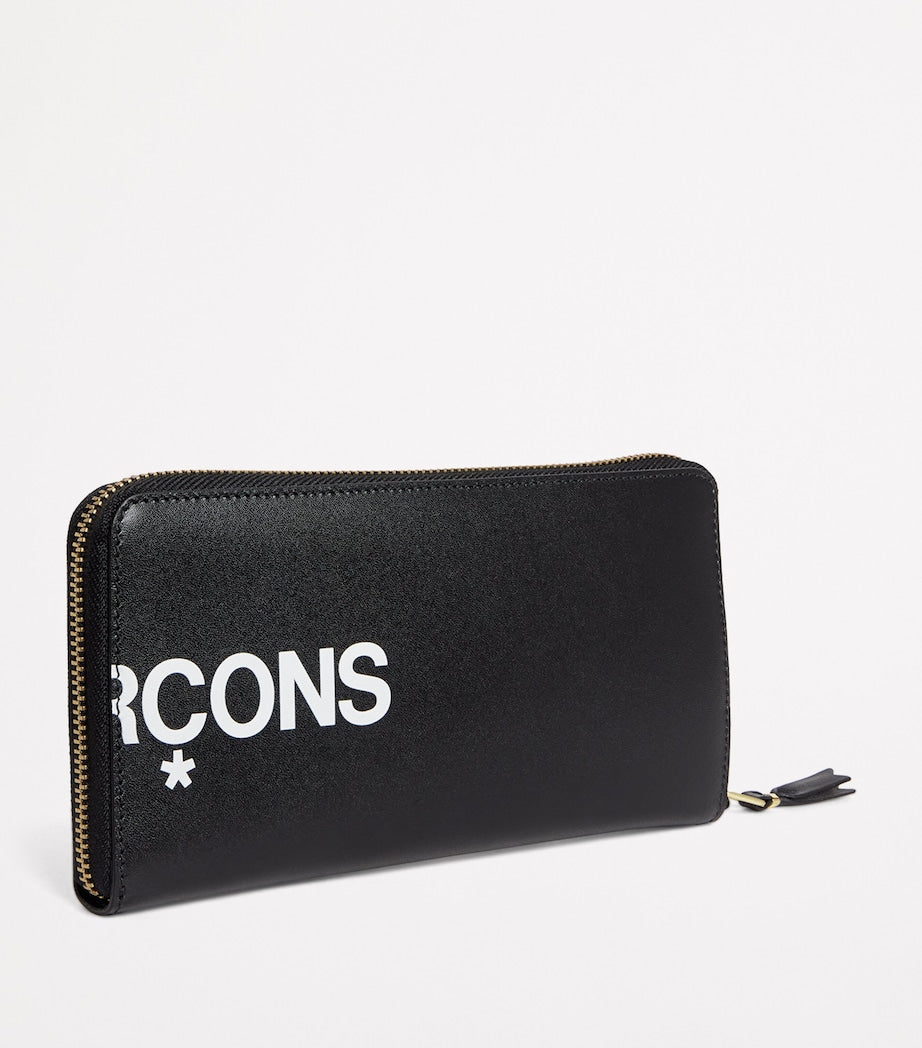 Comme des Garçons leather logo print wallet - British product