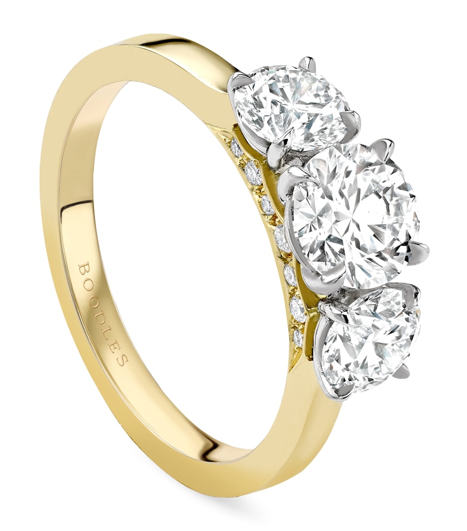 Boodles yellow gold platinum three stone diamond engagement ring, UK version