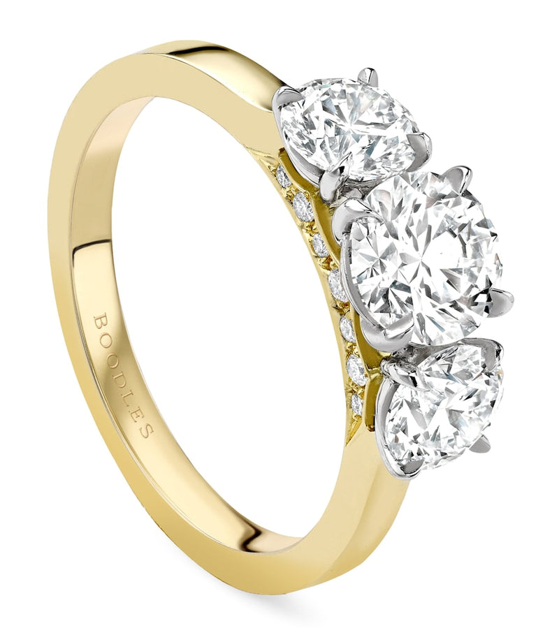 Boodles yellow gold platinum three stone diamond engagement ring, UK version