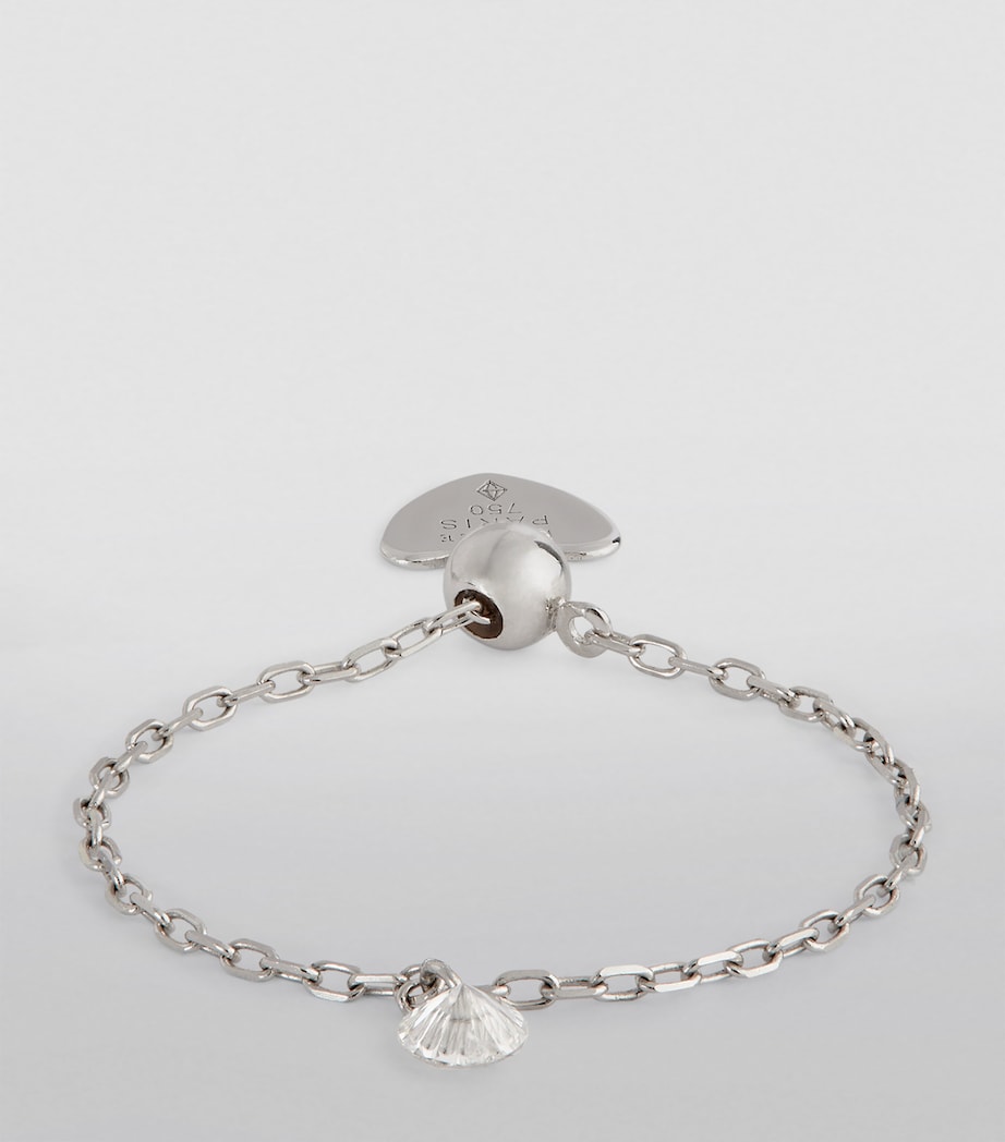 Persée white gold ring with floating diamond, UK version
