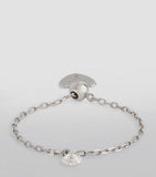 Persée white gold ring with floating diamond, UK version