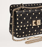Valentino Garavani Rockstud Spike small top-handle bag (British brand)