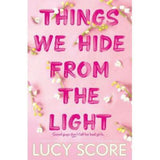 Lucy Score Things We Hide From Light paperback, UK version