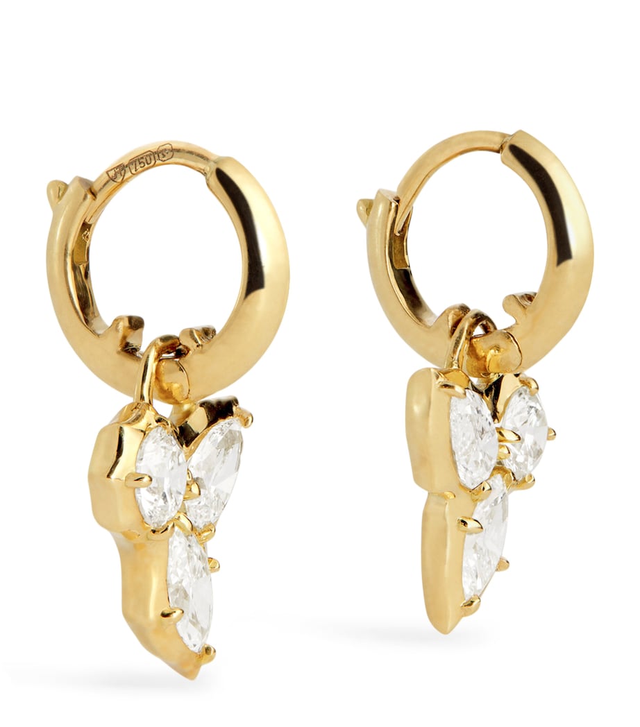 Jade Trau Poppy huggie earrings in yellow gold with diamonds, imported from the UK