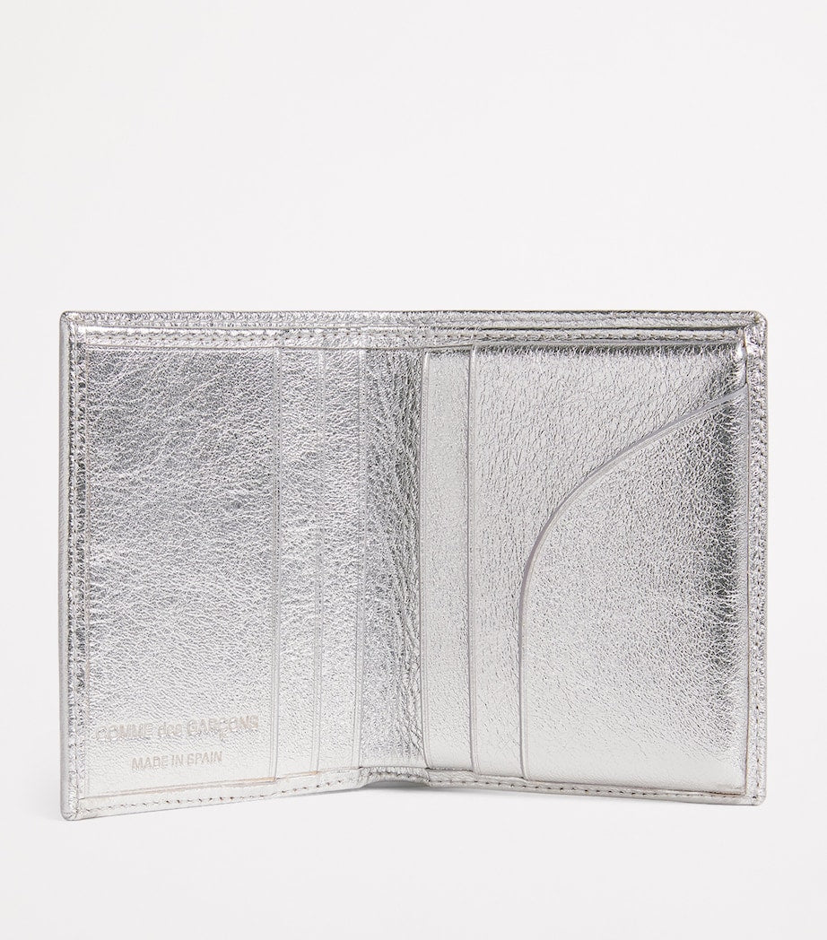 Comme Des Garçons leather folding card holder with silver metallic strip, UK version