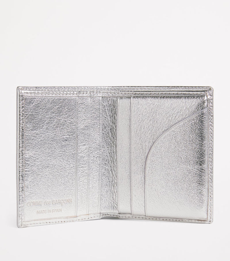 Comme Des Garçons leather folding card holder with silver metallic strip, UK version