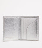 Comme Des Garçons leather folding card holder with silver metallic strip, UK version