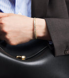 Suzanne Kalan yellow gold and diamond bangle (British brand)