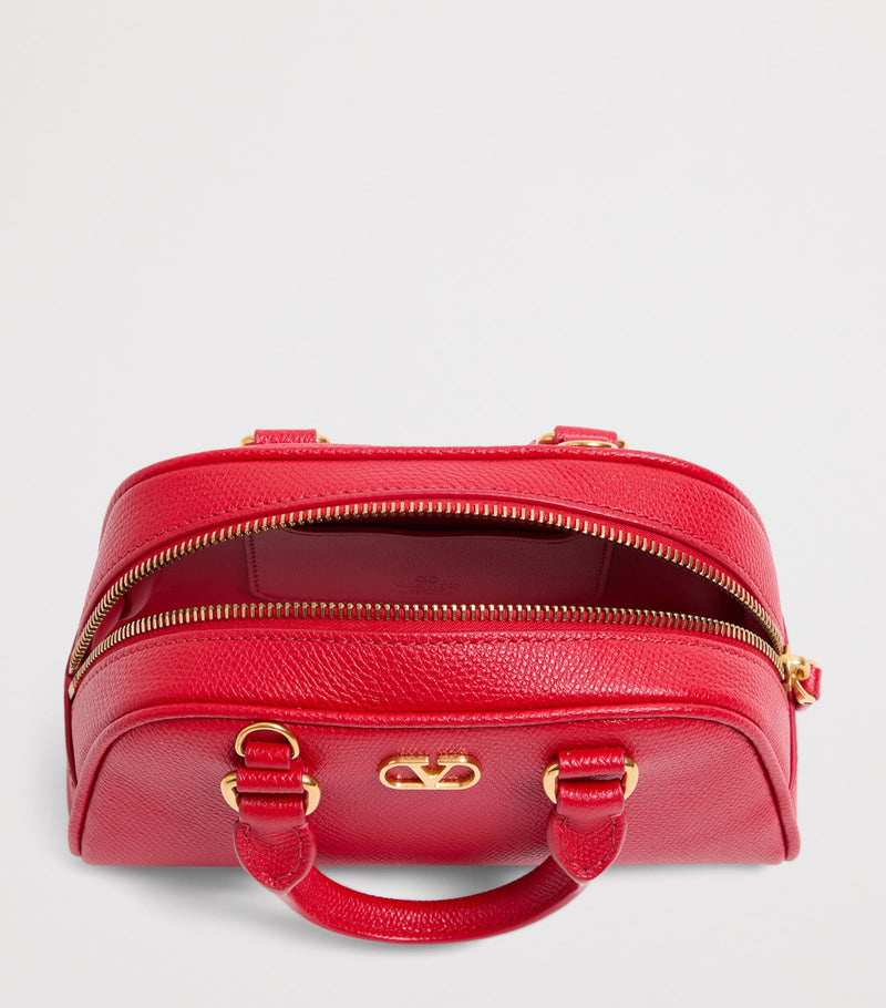 Valentino Garavani VLogo mini leather top-handle bag (British brand)