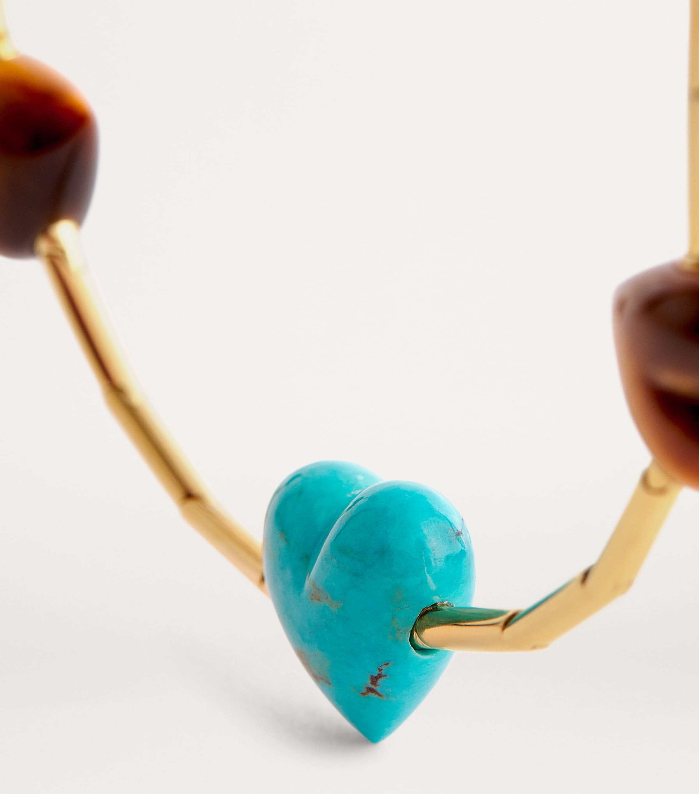 Emily P. Wheeler yellow gold necklace with gemstone hearts, imported from the UK