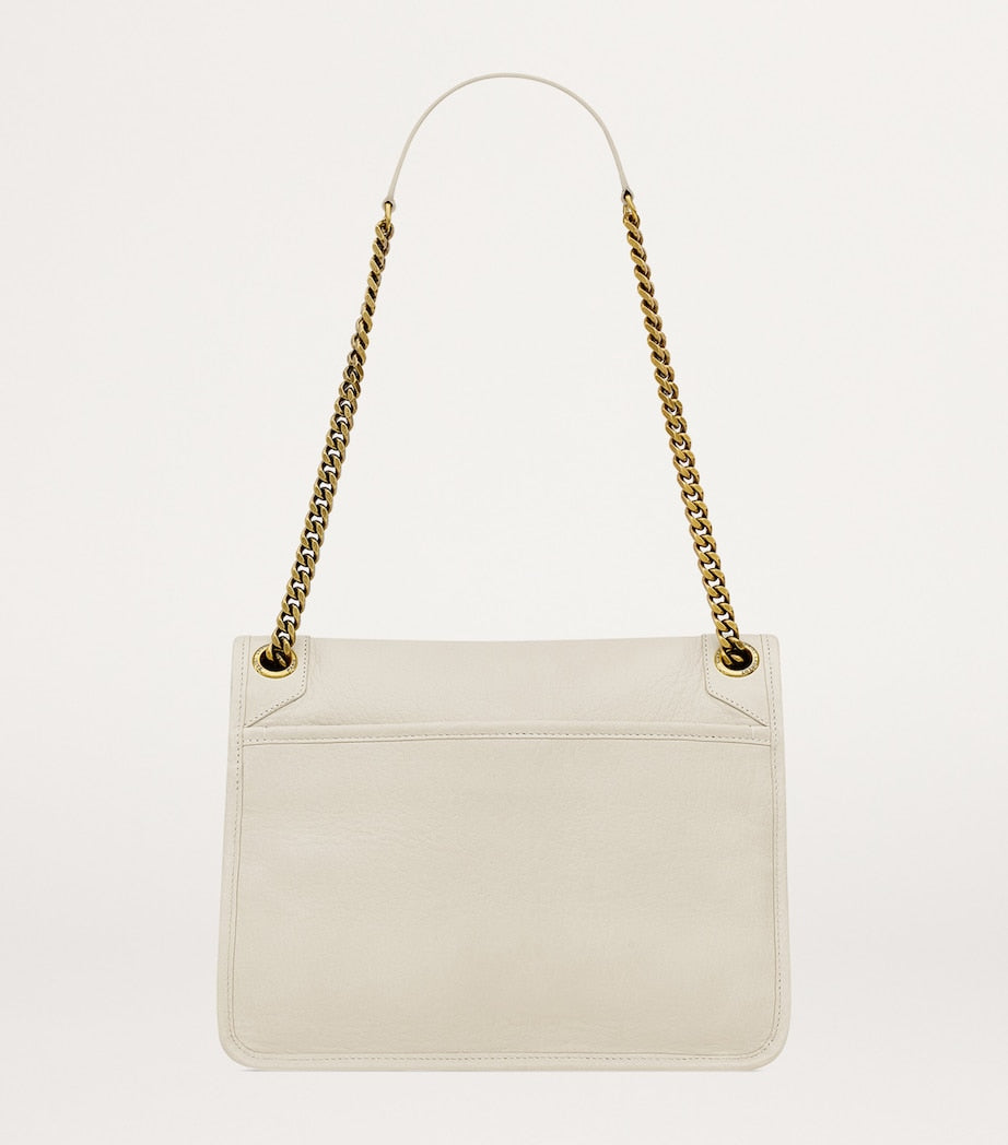 Saint Laurent Medium Niki Flap Bag in lambskin leather, UK version