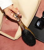 Oribe flat brush, imported from the UK