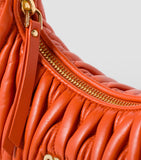 Miu Miu small matelassé leather Wander top-handle bag, UK version