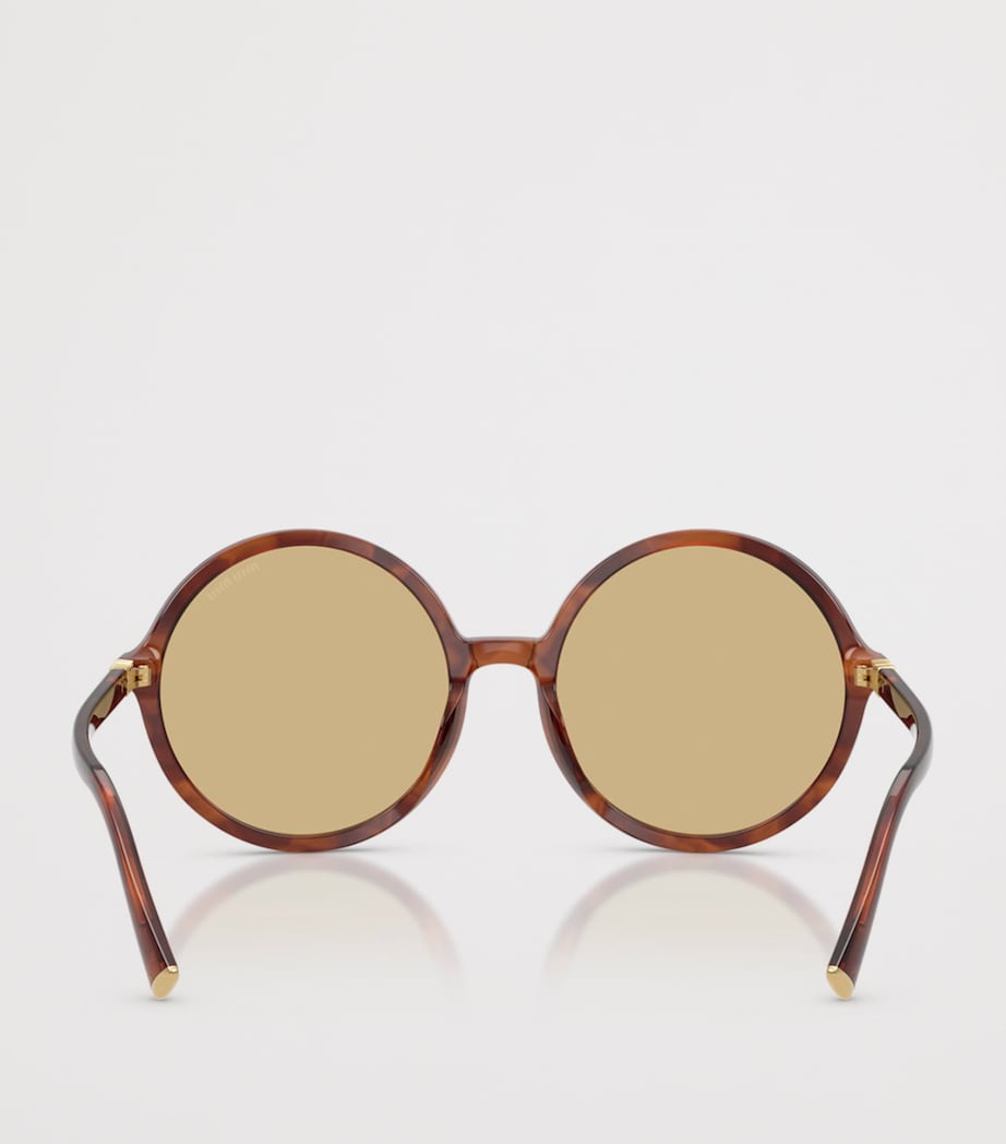 Miu Miu acetate oversized round sunglasses, imported from the UK